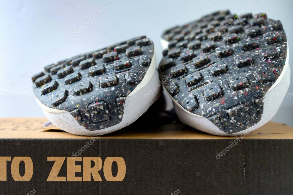 Lutsk, Volyn Region, Ukraine. February 02, 2024. The soles of the shoes include products of recycled content. Carbon footprint. Vegan shoes. Biodegradable box.