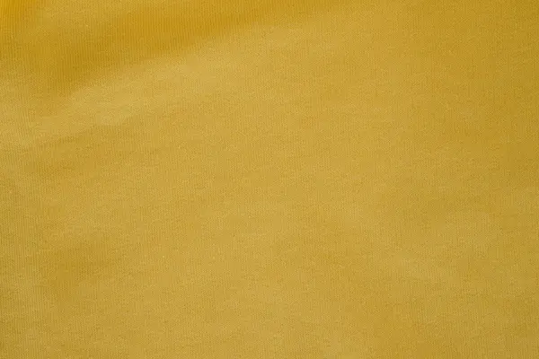 stock image Cotton elastane fabric Ray Flower or Radiant Yellow Color. Blending natural cotton fibers with synthetic elastane fibers. Yellow fabric background.