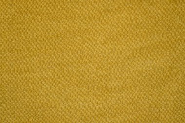 Cotton elastane fabric inside-out. Ray Flower or Radiant Yellow Color. Blending natural cotton fibers with synthetic elastane fibers. Yellow fabric background. clipart