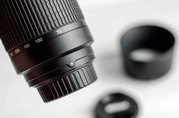 Photo of a camera lens, on a white background, macro photography of details