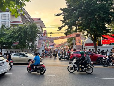 Bangkok, Thailand - 16 Nov 2024, People Gather Along the Roadside, Creating a Lively Atmosphere During the Golden Mountain Temple Festival at Wat Saket. clipart