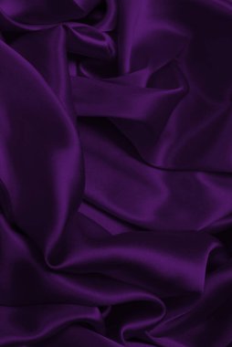 Zengin ve lüks kırmızı ipek kumaş dokusu. Üst görünüm.