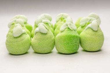 Green marshmallow candy isolated on a white background. 