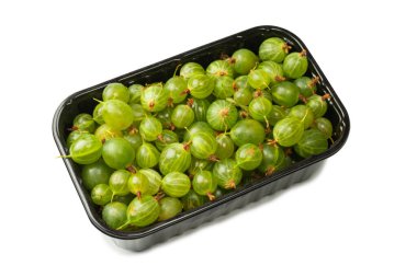 A group of fresh gooseberries isolated on a white background. 