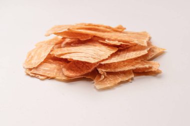 A group of tasty beer snacks. Dehydrated chicken meat slices. 