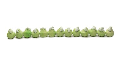 Green marshmallow candy isolated on a white background. 