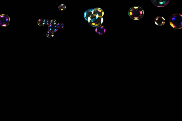Seifenblasen Isoliert Auf Schwarzem Hintergrund Kopierraum — Stockfoto