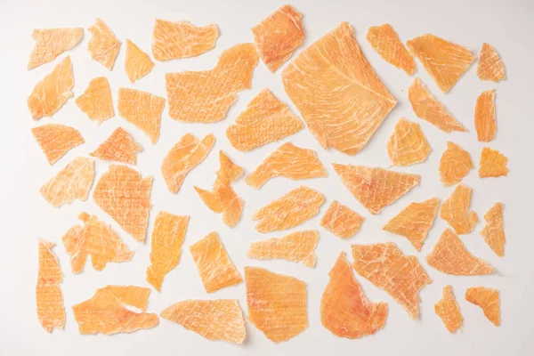 stock image A group of tasty beer snacks. Dehydrated chicken meat slices. 