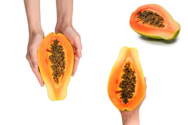 Papaya meyvesi beyaz arka planda izole bir şekilde kadınların elinde. Tropik meyve. Yarım papaya.. 