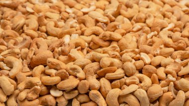 Lezzetli tuzlu fındık karışımı. Bir grup badem, fıstık, ceviz, macadamia, kaju..