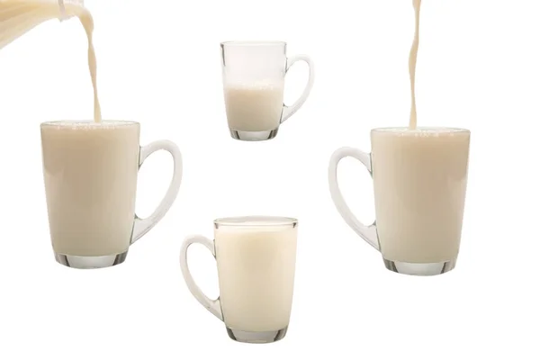Milch Wird Aus Einer Flasche Einen Becher Geschüttet Milchspritzer — Stockfoto
