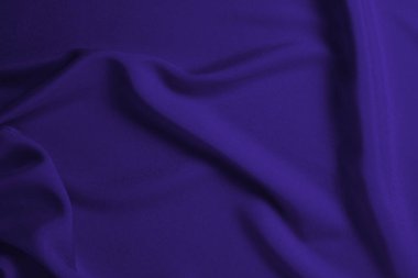 Zengin ve lüks kırmızı ipek kumaş dokusu. Üst görünüm.