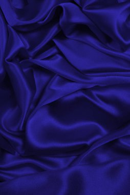 Zengin ve lüks kırmızı ipek kumaş dokusu. Üst görünüm.