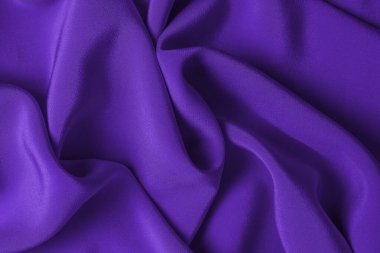 Zengin ve lüks kırmızı ipek kumaş dokusu. Üst görünüm.