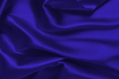 Zengin ve lüks kırmızı ipek kumaş dokusu. Üst görünüm.