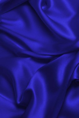 Zengin ve lüks kırmızı ipek kumaş dokusu. Üst görünüm.