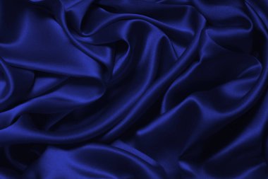 Zengin ve lüks kırmızı ipek kumaş dokusu. Üst görünüm.