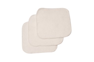 Stack of white cotton sponges isolated on a white background.