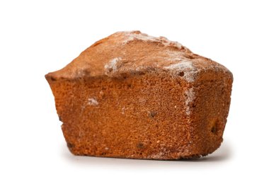 A cupcake with raisins isoalted on a white background. Muffin. 