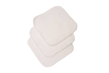 Stack of white cotton sponges isolated on a white background.
