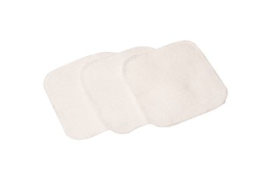 Stack of white cotton sponges isolated on a white background.