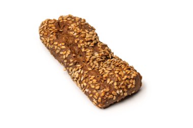 A loaf of bread with sunflower seeds isolated on a white background. 