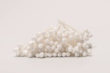 Group of white cotton buds isolated on a white background.