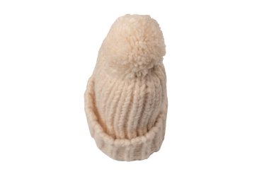 Beige warm beanie hat with pom pom isolated on a white background. 