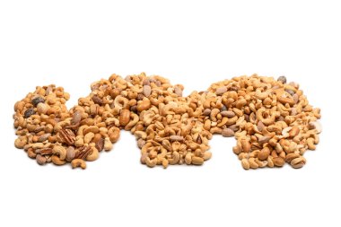 Lezzetli tuzlu fındık karışımı. Bir grup badem, fıstık, ceviz, macadamia, kaju..