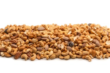 Lezzetli tuzlu fındık karışımı. Bir grup badem, fıstık, ceviz, macadamia, kaju..