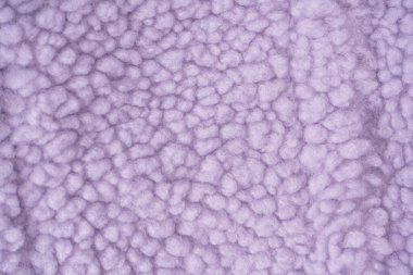 Purple fur texture as a background. Top view. 