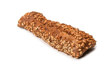 A loaf of bread with sunflower seeds isolated on a white background. 