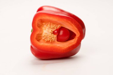 Red bell pepper isolated on white background. Half of bell pepper. 