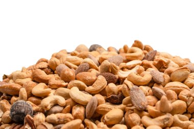 Lezzetli tuzlu fındık karışımı. Bir grup badem, fıstık, ceviz, macadamia, kaju..