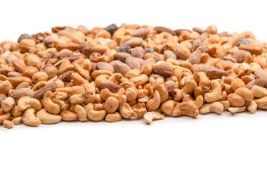 Lezzetli tuzlu fındık karışımı. Bir grup badem, fıstık, ceviz, macadamia, kaju..