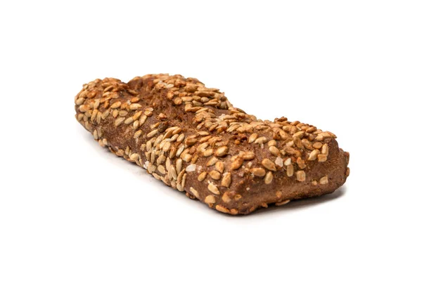 stock image A loaf of bread with sunflower seeds isolated on a white background. 