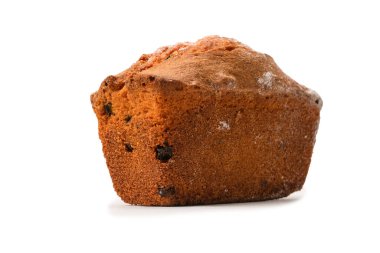 A cupcake with raisins isoalted on a white background. Muffin. 