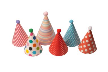 A group of bright and colorful birthday caps isolated on a white background. Holidays cocept. 