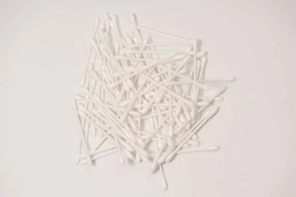 stock image Group of white cotton buds isolated on a white background.