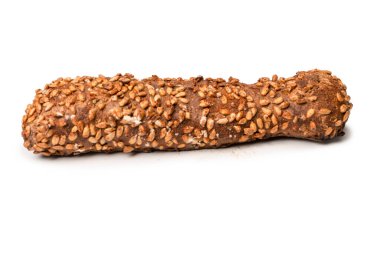 A loaf of bread with sunflower seeds isolated on a white background. 