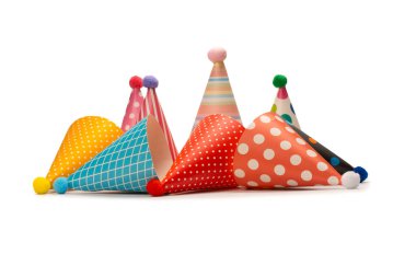 A group of bright and colorful birthday caps isolated on a white background. Holidays cocept. 