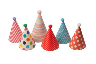A group of bright and colorful birthday caps isolated on a white background. Holidays cocept. 