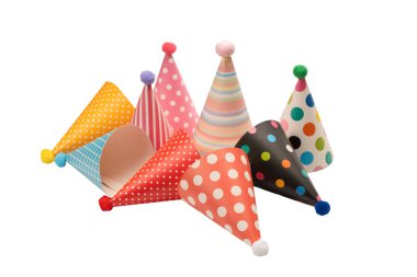 A group of bright and colorful birthday caps isolated on a white background. Holidays cocept. 