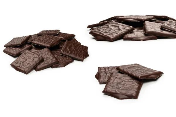 白い背景に隔離されたダークチョコレートキャンディー — ストック写真