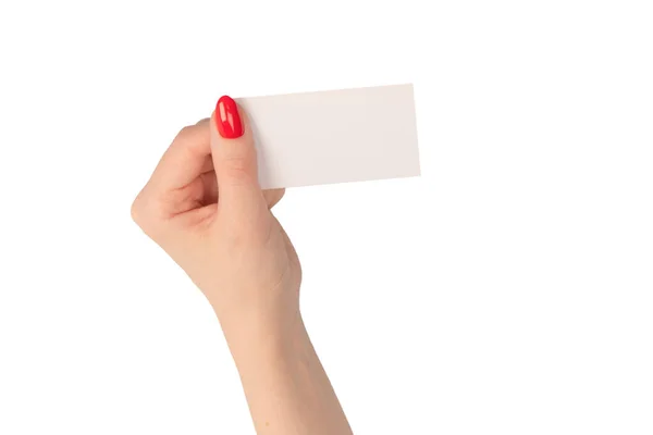 空卡片在女人的手上用红色的钉子隔离在白色的背景上 复制空间 — 图库照片