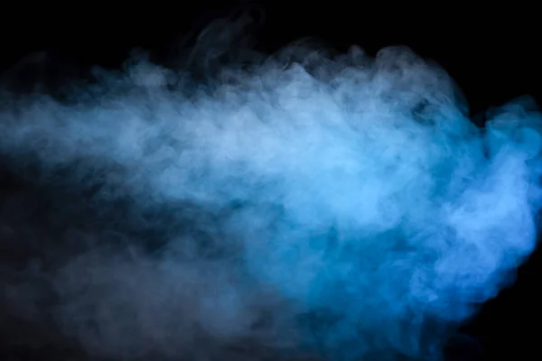 stock image Blue and yellow steam on a black background. Copy space.