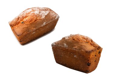 A cupcake with raisins isoalted on a white background. Muffin. 