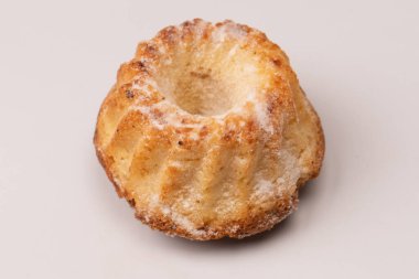 A cake made of cottage cheese isolated on a white background. 