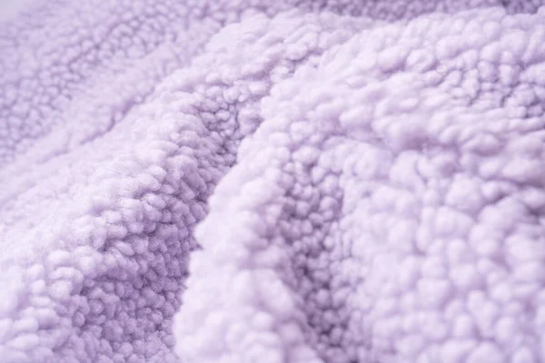 Purple fur texture as a background. Top view.