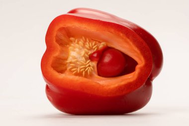 Red bell pepper isolated on white background. Half of bell pepper. 